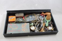 Display Case Full of Collectibles Watches & More