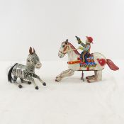 2 Tinplate Mechanical Toys, Zebra, Horse & Cowboy