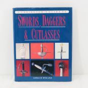 Guide to Swords, Daggers, & Cutlasses book