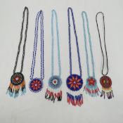 Native American Beaded necklaces in Riker case