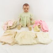 Antique Horsman doll with clothes