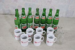 7 Mountain Dew Bottles & 7 Northwest Airlines Mugs