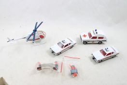 4 Corgi Diecast Vehicles & 3 Figures