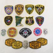Assorted US police badges and patches