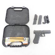 Glock 22 Gen 4 .40 caliber pistol with extra grips
