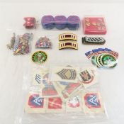 Mixed military insignia, some unissued & more