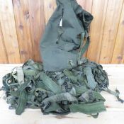 Duffle bag of used Alice Gear Y Suspenders