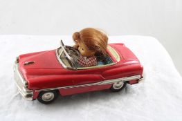 Girl in Convertible Tin Friction 7