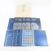 Lincoln Cent Collection in blue folders, 1973 bag