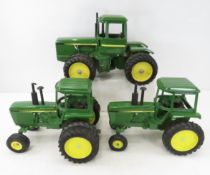 3 Ertl John Deere Tractors