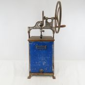 Antique metal butter churn
