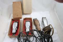 4 Hair Clippers 3 are Wahl & 1 is Andis