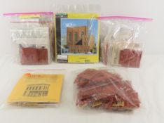 15 HO scale packages of unbuilt structures
