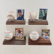 4 autographed baseballs on plaques with cards