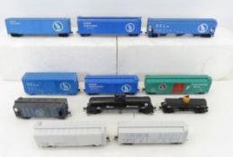 11 HO scale Box cars & Tanker