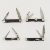 4 Ka-Bar pocket knives, 1 with dog head
