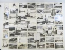 60 unused Alaska Postcards, most are RPPC