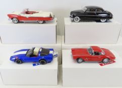 4 Danbury Mint Diecast Cars in boxes