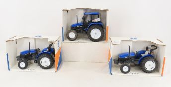 3 New Holland Die Cast Tractors in Box