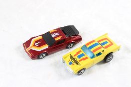 2 Hot Wheels '77 T-Bird, '83 Speed Crasher Nissan