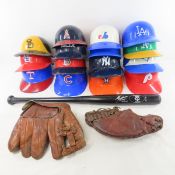 Plastic batting helmets, baseball mitts & bat
