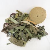 Large collection of US military belts and straps