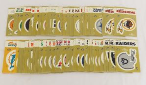 67 1982 NFL stickers & 6 1984 stickers