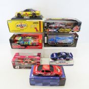 7 Assorted Diecast Race Cars in Boxes