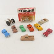 9 Tootsietoy Cars & 1 Cannon, 1 car on card
