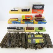 12 Vintage HO Model Trains in boxes & Track