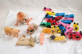 Zip Stick Cars, 4 Crawling Babies, 4 Mini Dolls