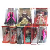 9 Mattel Boxed Happy Holiday Barbie Dolls
