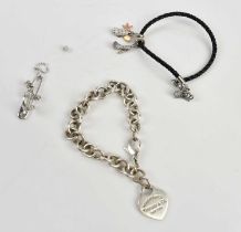 TIFFANY & CO; a sterling silver bracelet with heart clasp, length 17cm, white metal anchor