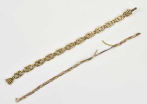 An Italian yellow metal bracelet stamped '9K' and a further tri-metal bracelet stamped '9K',