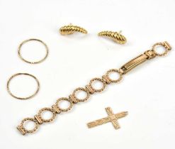 A 9ct yellow gold watch strap, 9ct gold crucifix, a pair of 9ct gold earrings and a pair of yellow