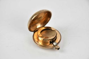 A 9ct yellow gold sovereign holder with chased decoration, approx 21.5g. Condition Report: