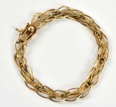 A yellow metal filigree bracelet, stamped '14K', approx 10.6g.
