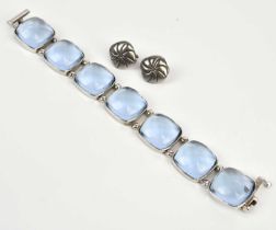 BACCARAT; a decorative aquamarine effect glass bracelet (af) and a pair of sterling silver earrings,