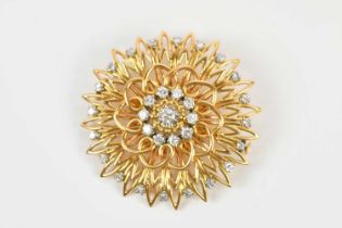 A yellow metal diamond set cluster brooch, with wire work surround, diameter 40mm, approximate