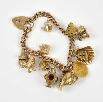 A 9ct yellow gold curb link bracelet with 9ct gold padlock clasp, containing twelve 9ct gold and