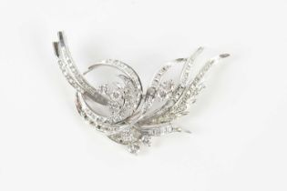 A Chinese white metal diamond set brooch, with eight brilliant cut diamonds, each weighing