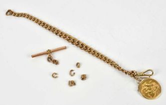 An Elizabeth II full sovereign, 1978, in loose 9ct gold mount, suspended on a part Albert chain