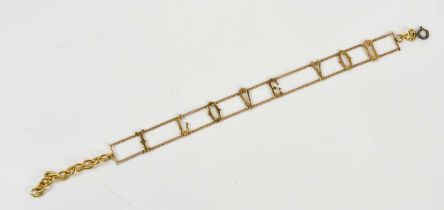 A gold plated chain with the words 'I Love You', with four letters, stamped 9ct gold, approx 6g.