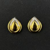 Ohrclips, 333/8k Weiß- und Gelbgold (punziert), Gesamtgewicht 3,45g, je besetzt mit einem kleinen D