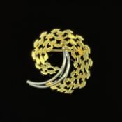 Moderne Brosche, 333/8k Weiß- und Gelbgold (punziert), Gesamtgewicht 3,85g, Durchmesser ca. 3,2cm
