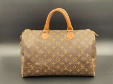 LOUIS VUITTON, Speedy 35, monogram canvas and stitched leather holdall,