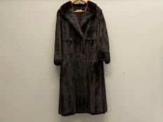 NORWICH FUR CO, early 20th century, ¾ length, dark brown fur coat.&nbsp;