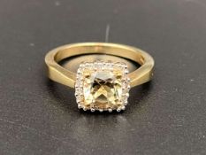 A Citrine and Diamond set, 9ct gold ring.