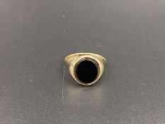 A Black Onyx & 9ct gold signet ring