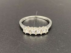 A Diamond set, 9ct white gold ring,